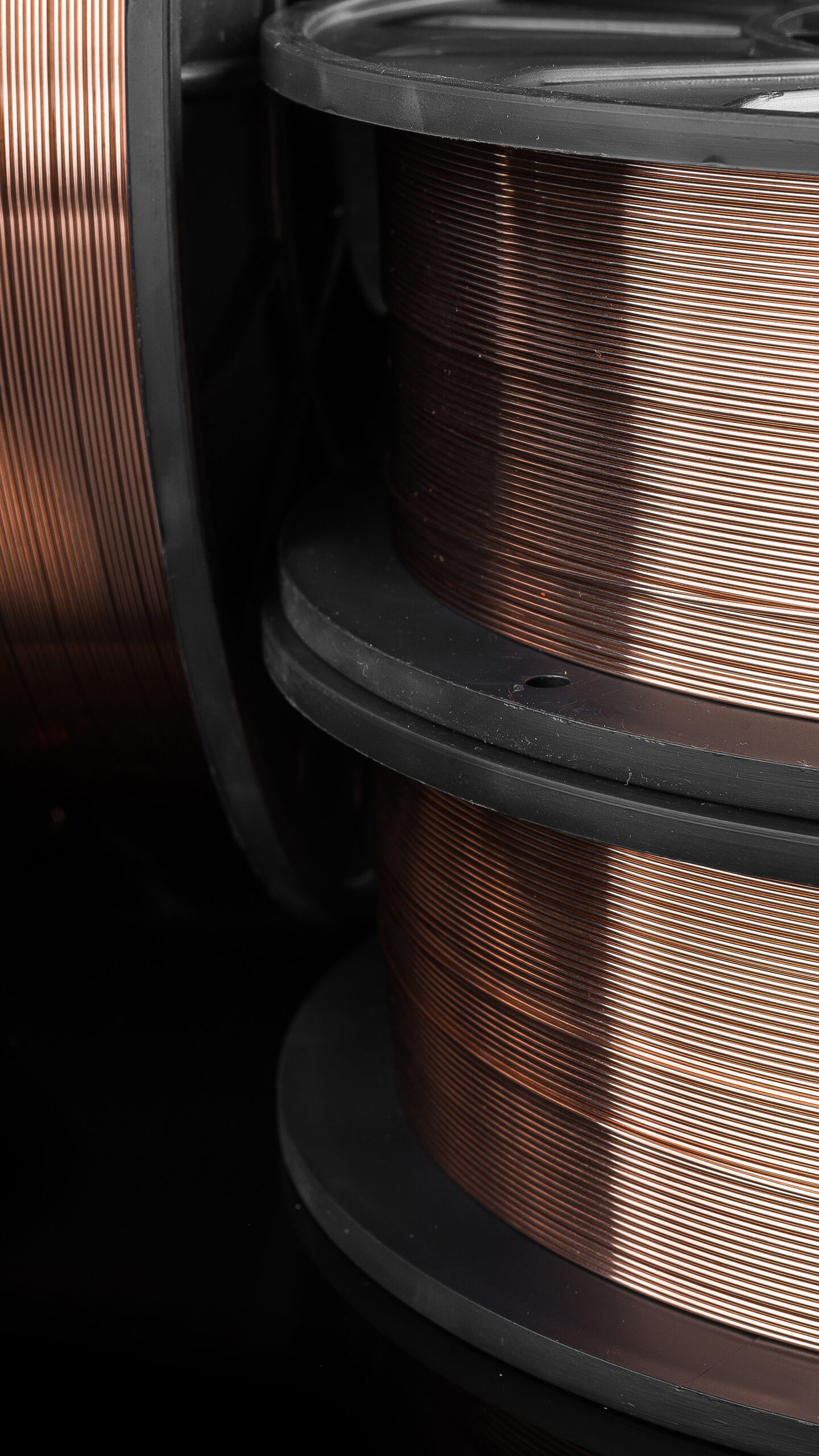 welding wire on a black background, copper cable factory